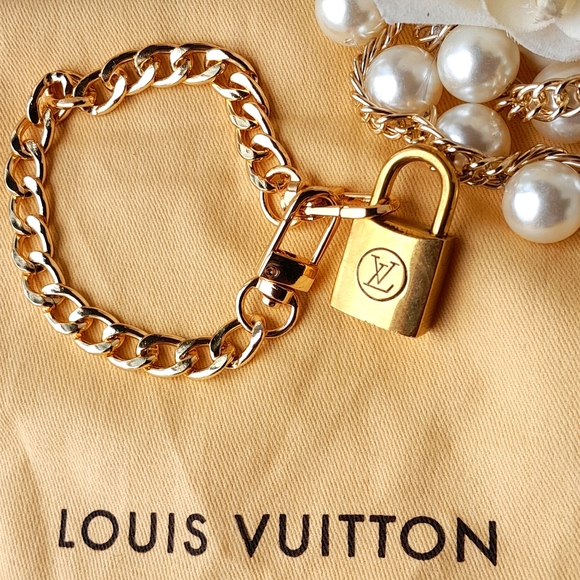 Louis Vuitton Accessories - Louis Vuitton  Vintage Lock with unbranded Chain!